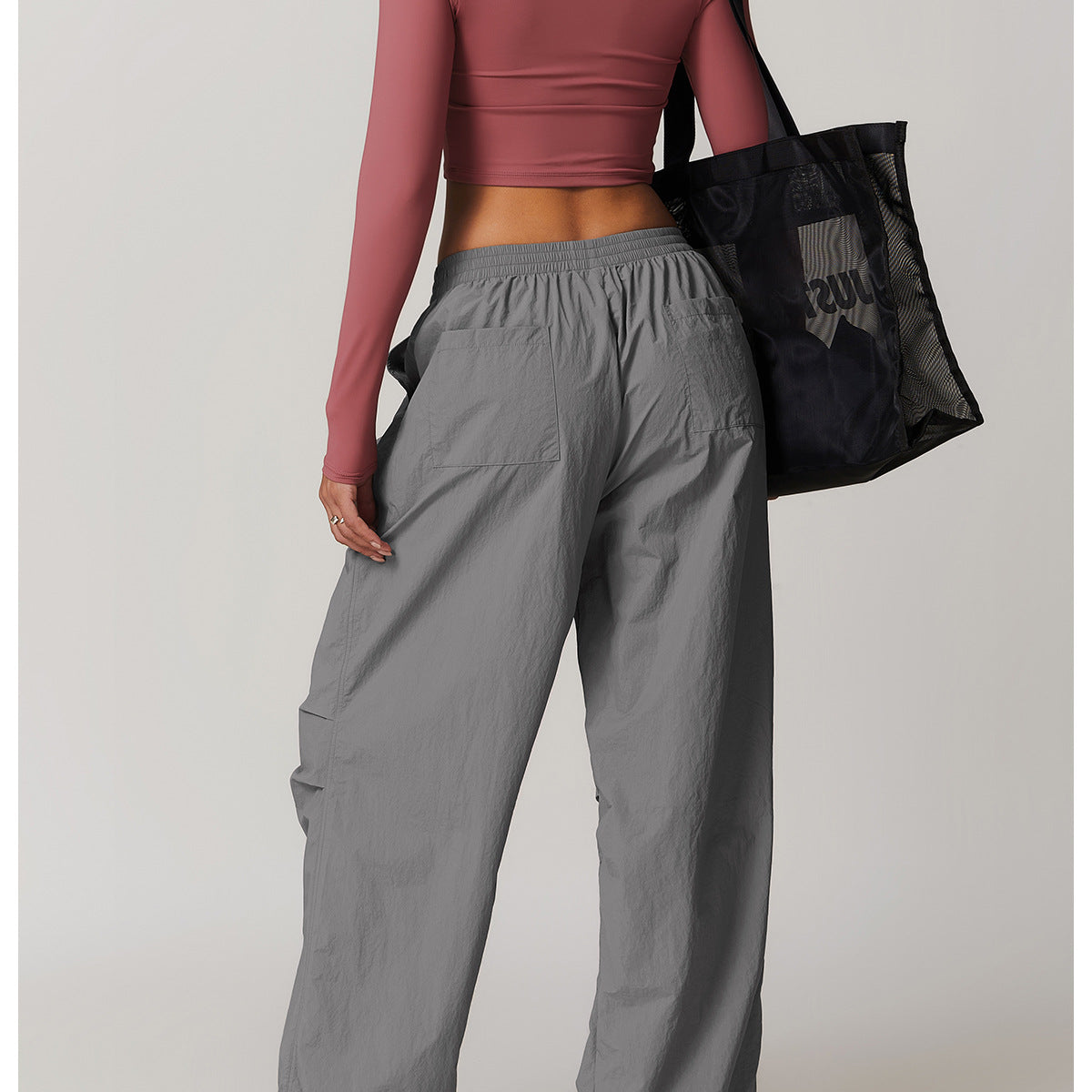 Woman wearing Casual Sports Pants Multi Pocket Running Fitness Pants for active fashion