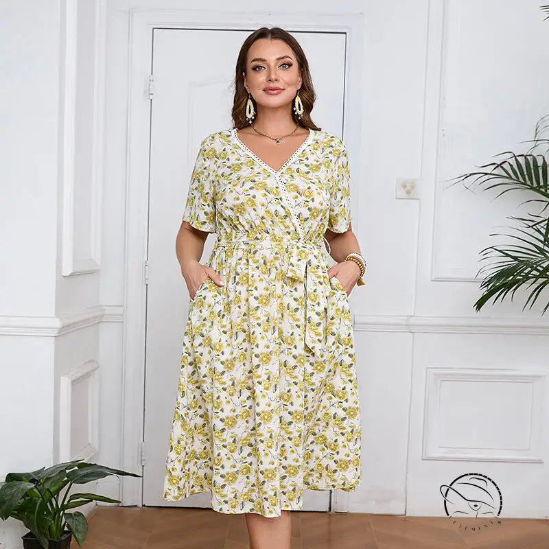 Boho lace floral dress: woman in V-neck knee-length print with cinched waist