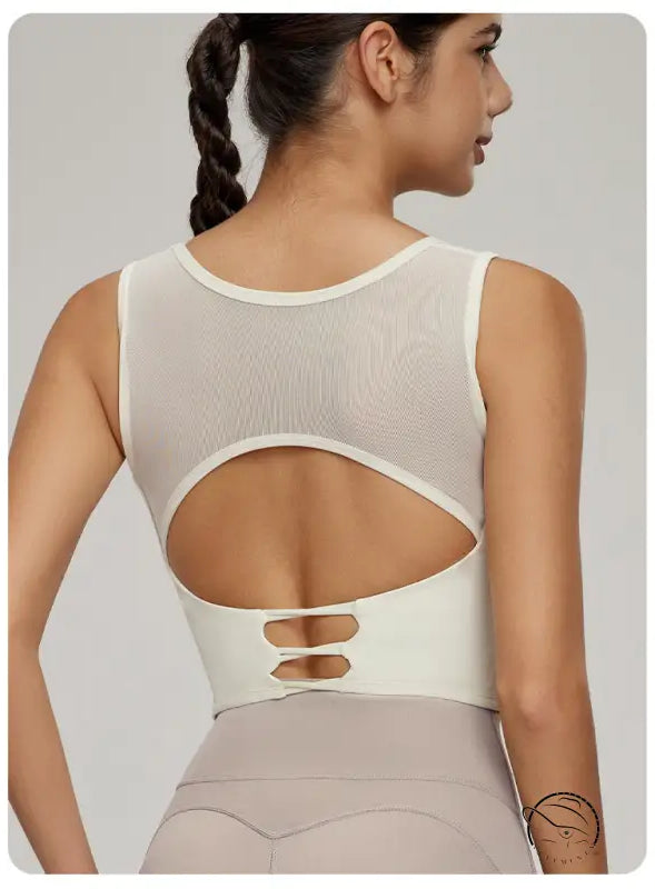 Woman modeling Beauty Back Mesh Workout Top with langry fashion mesh upper back