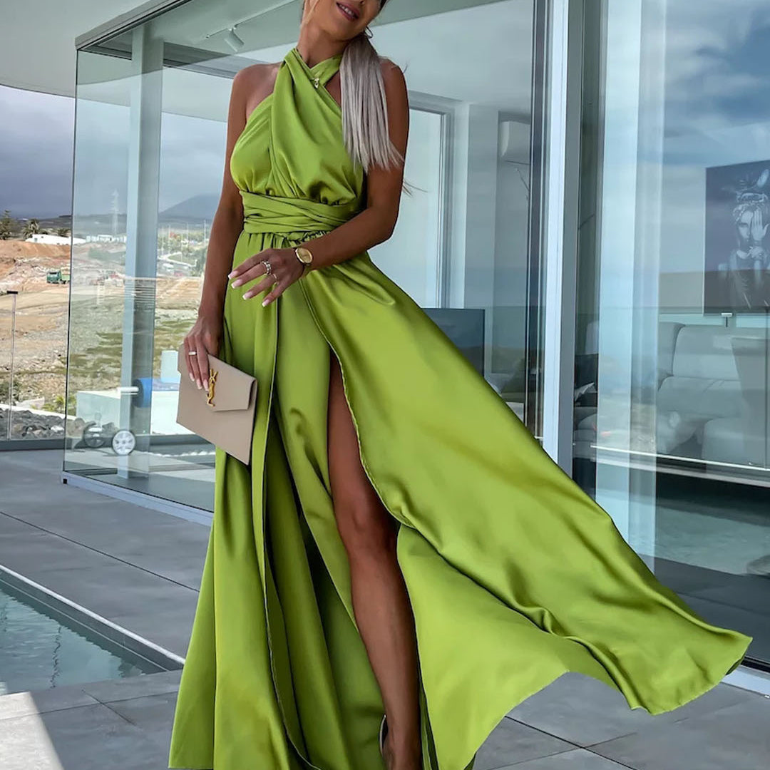 Woman in a flowing green halter dress showcasing Langry fashion for casual wear