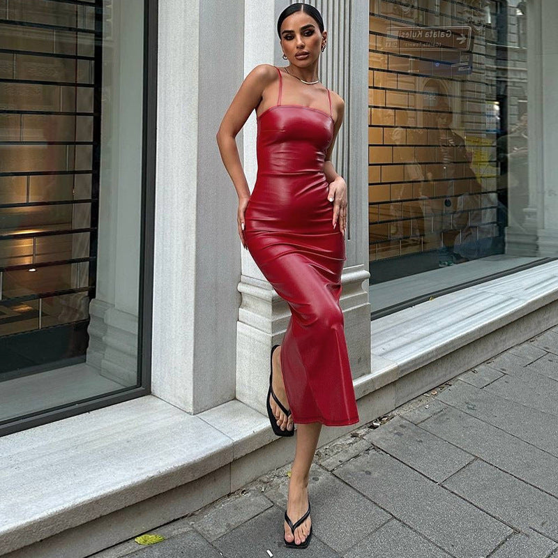 Red faux leather midi dress displayed in a luxurious backless fashion design