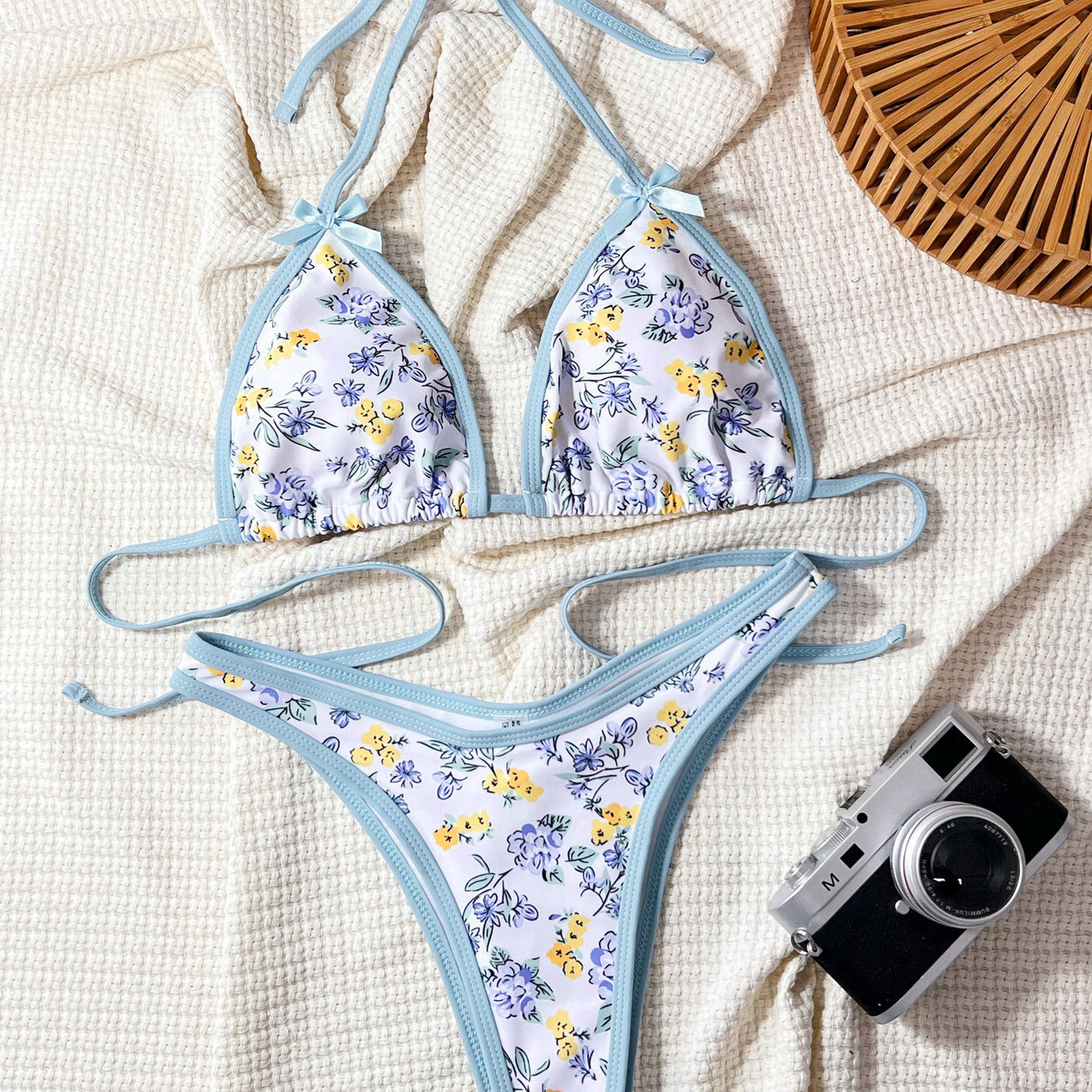 Light blue and white floral print string bikini for stylish summer fashion ملابس