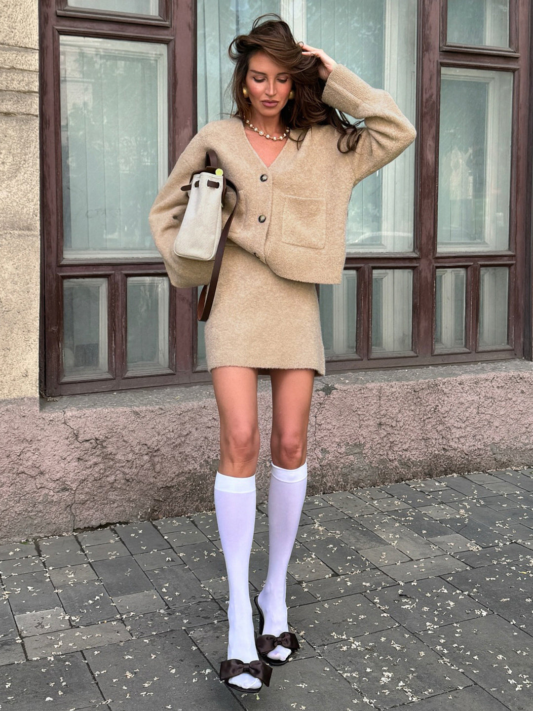 Beige oversized Langry fashion cardigan with pockets, white knee-high socks outfit