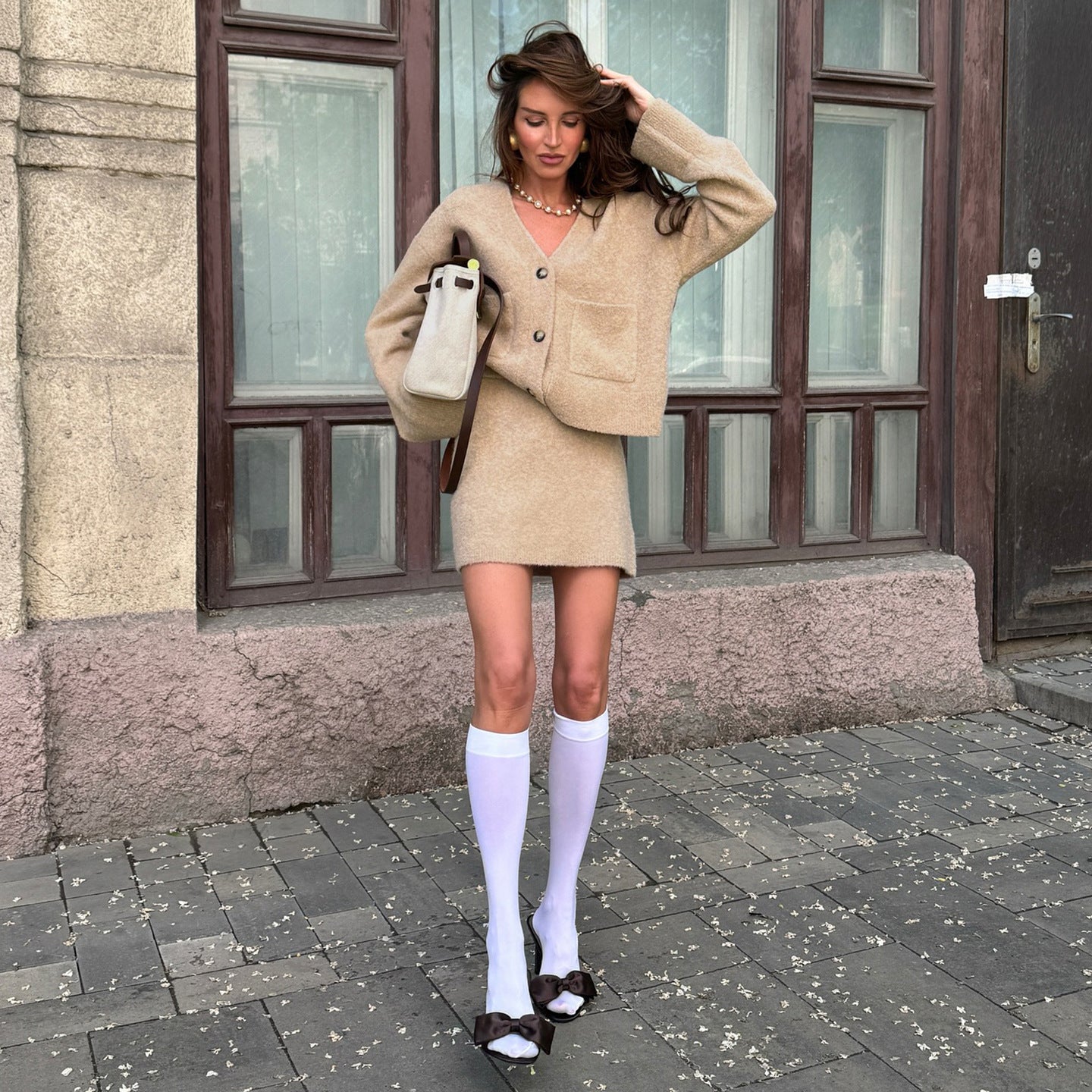 Beige oversized Langry fashion cardigan with pockets, white knee-high socks outfit
