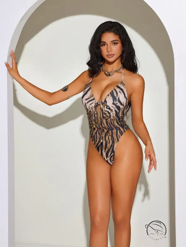 Hot leopard print one-piece swimsuit with plunging neckline and halter straps