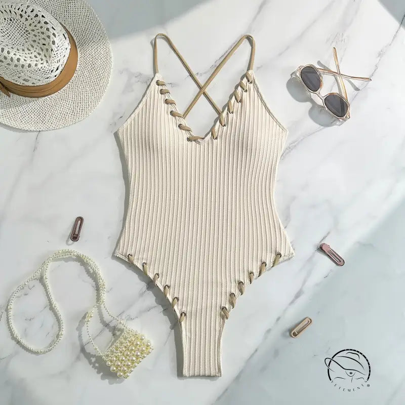 Stunning matching sling cream ribbed one-piece swimsuit
