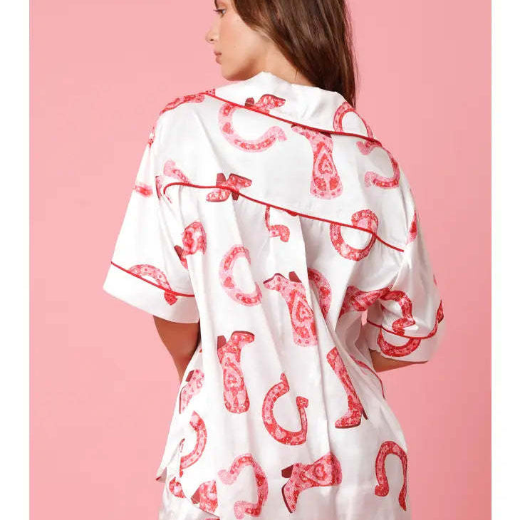 Elegant white satin pajama set with red piping and pink cowboy boots pattern for cute two piece set pajamas