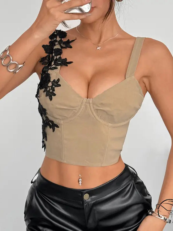 Beige lace-trimmed crop top corset with floral appliques and adjustable straps