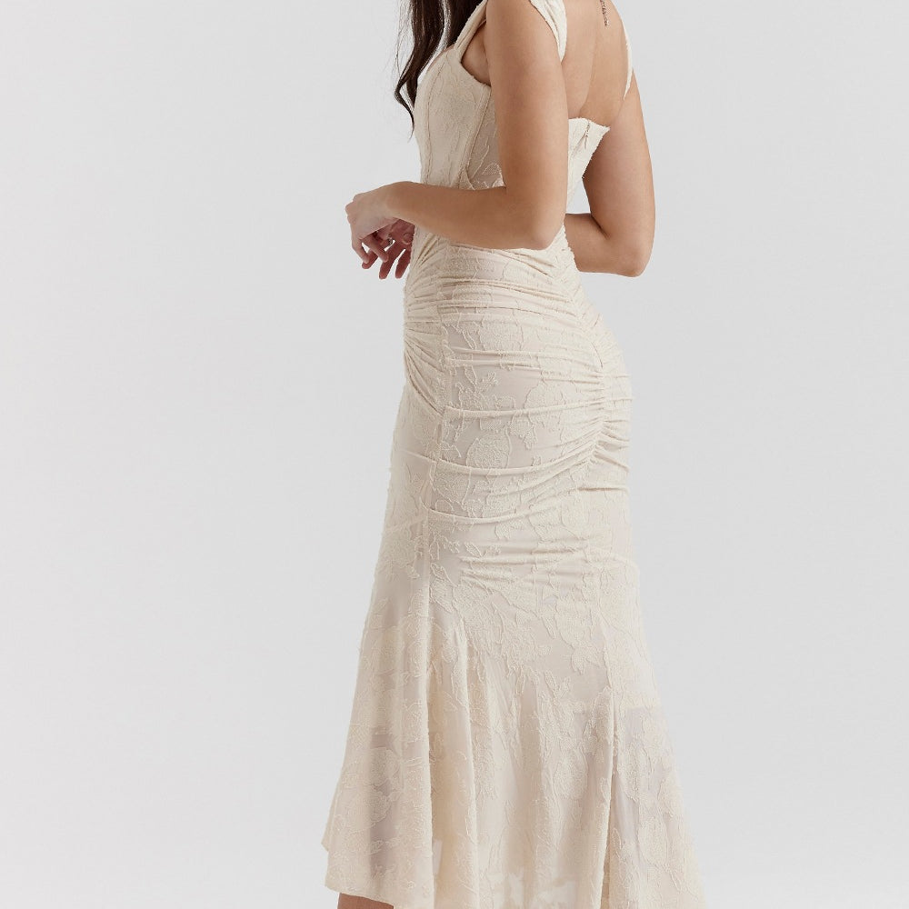 Cream-colored cami dress featuring a mermaid-style skirt for elegant fashion moments