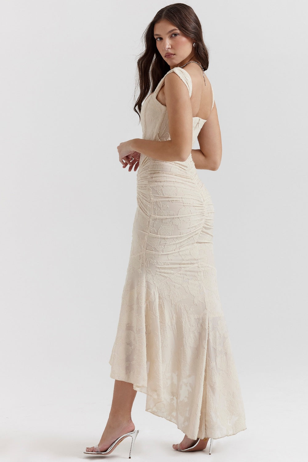 Cream-colored cami dress featuring a mermaid-style skirt for elegant fashion moments