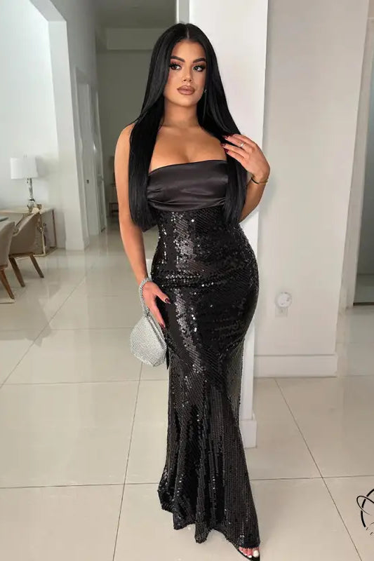 Elegant black sequined gown with amazing satin stitching