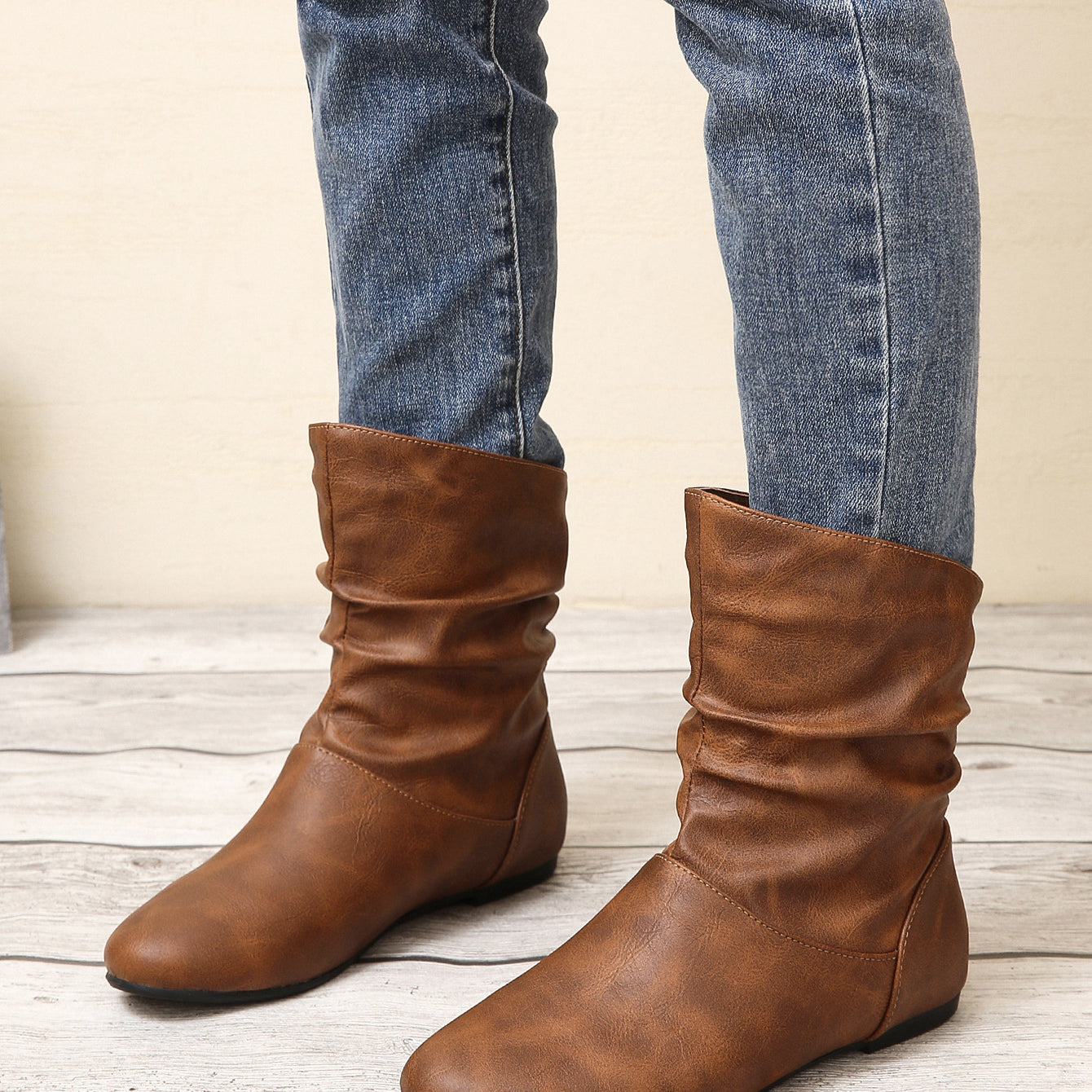 Brown slouch boots in faux leather, perfect for stylish langry fashion ملابس