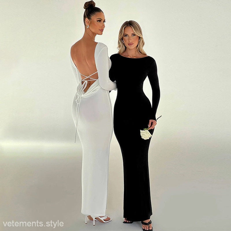 Two women wearing stylish backless elegant dresses with long sleeves for formal occasions