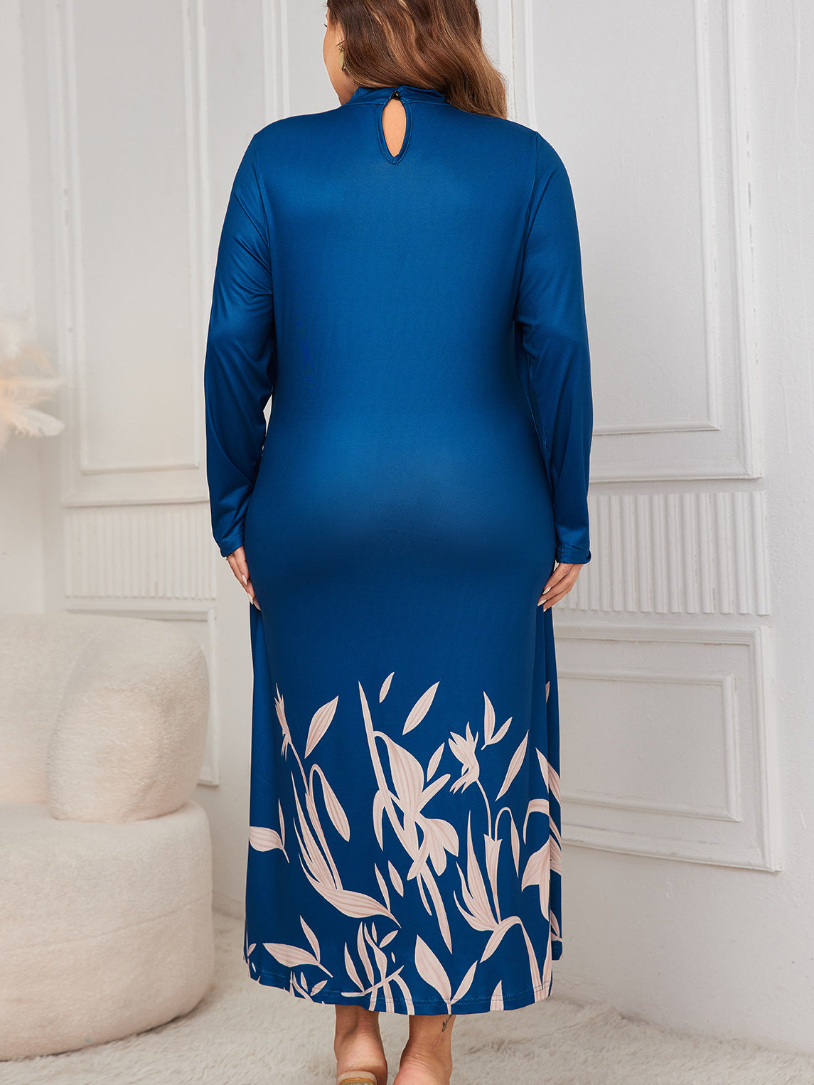 Faux two piece long sleeve maxi dress with floral hem and back keyhole cutout