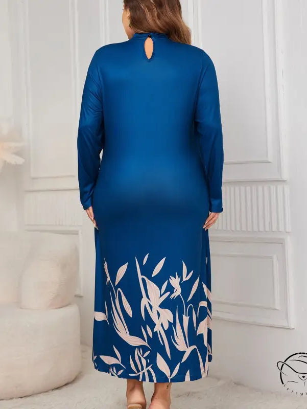 Faux two piece long sleeve blue maxi dress with back keyhole and floral hem