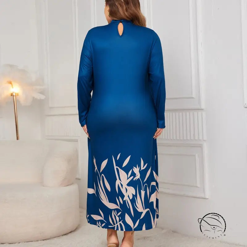 Faux two piece long sleeve blue maxi dress with back keyhole and floral hem