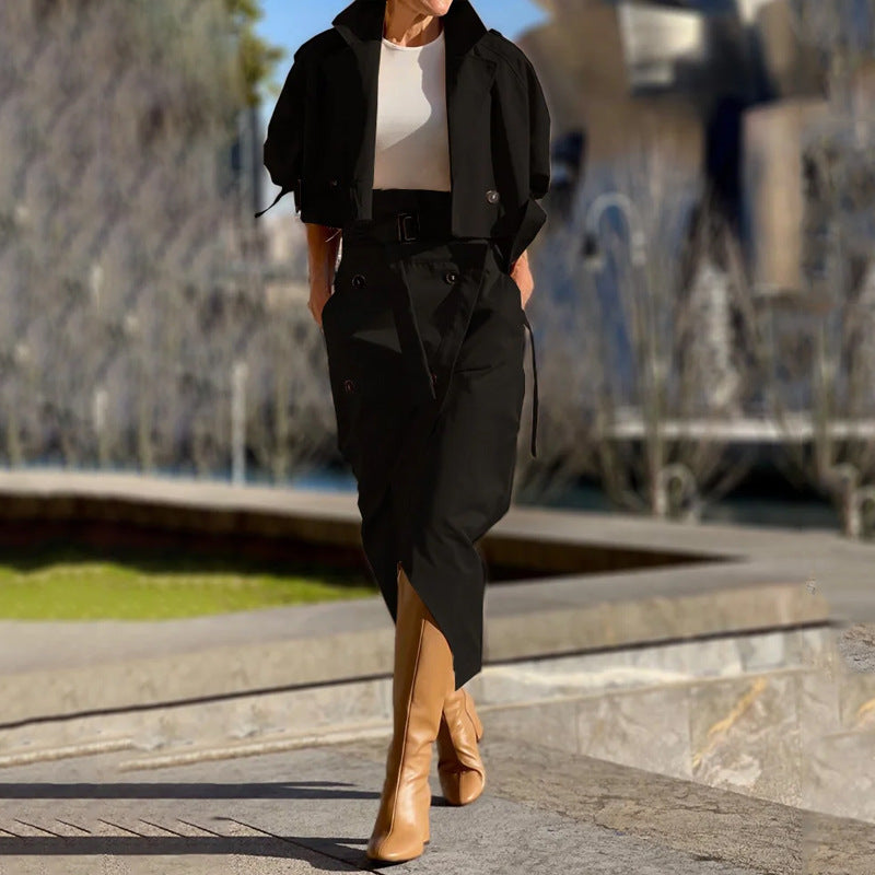 Elegant black skirt suit with tan boots showcasing stylish ladies fashion and ملابس trends