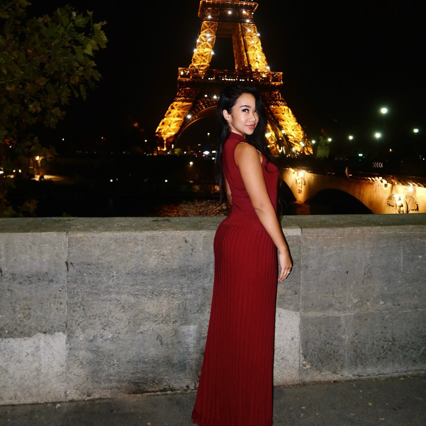 Enchanting Knitted Maxi Dress in red, featuring a sleeveless, form-fitting design