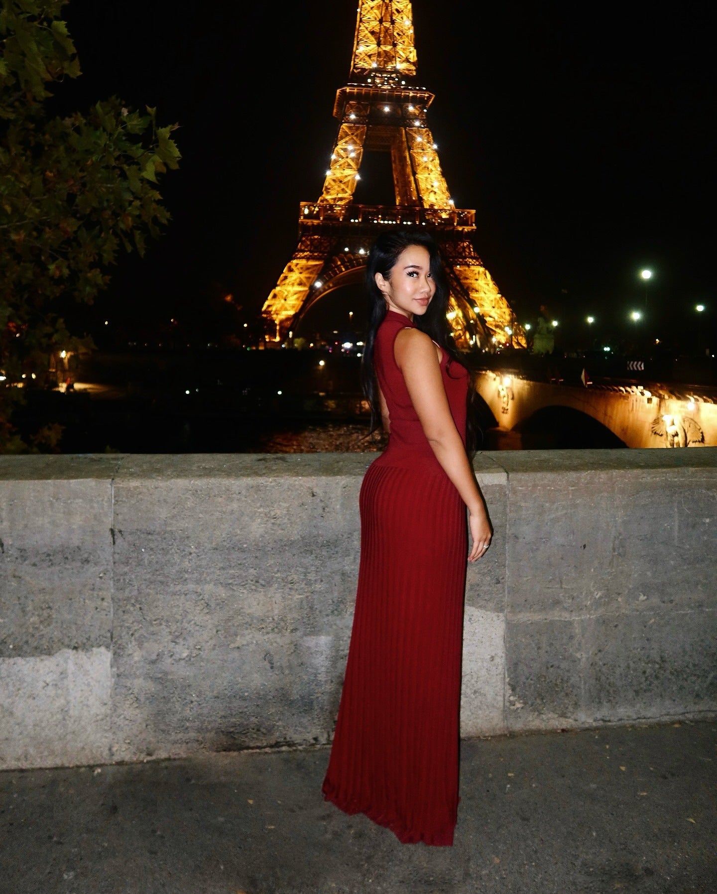 Enchanting Knitted Maxi Dress in red, featuring a sleeveless, form-fitting design