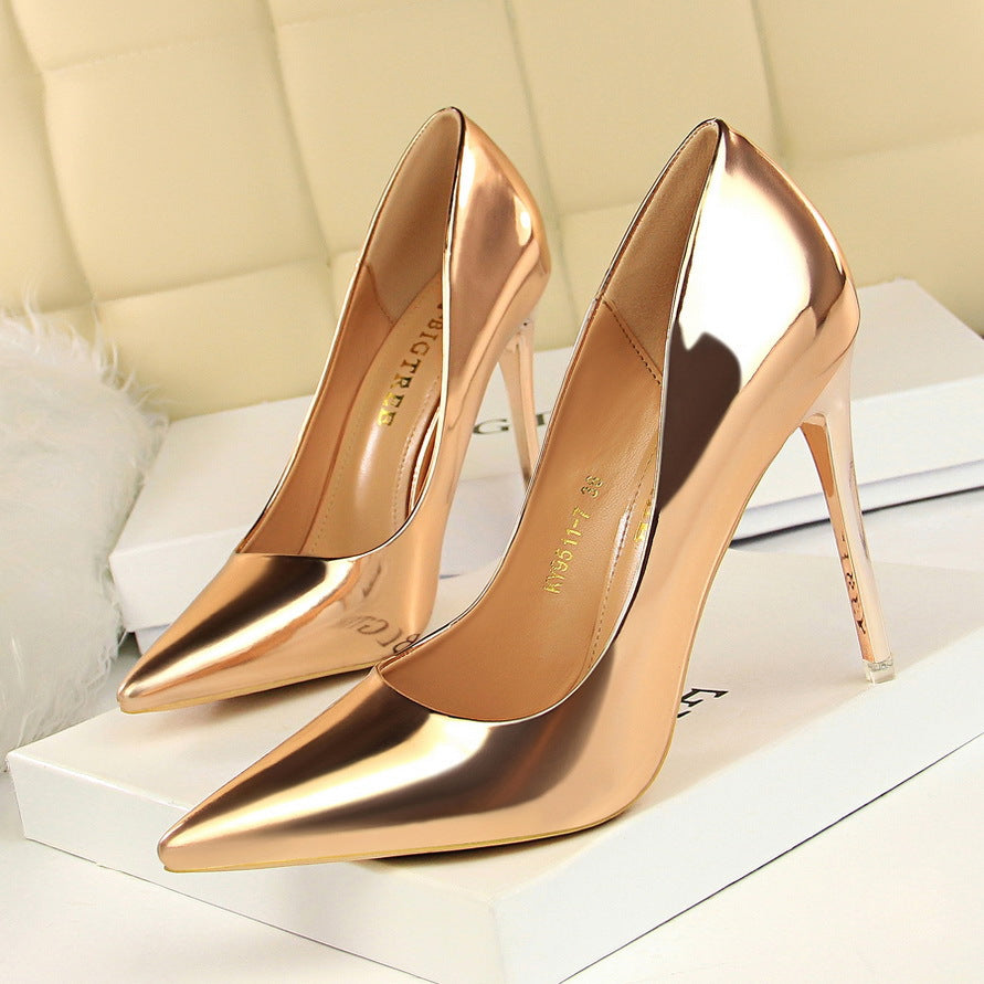 Pair of shiny rose gold stiletto heels from Fashionable Metal High Heels for stylish fashion