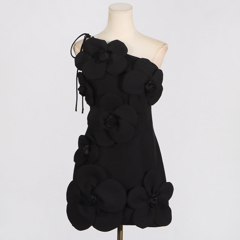 Elegant black one-shoulder fashion dress with floral embellishments for stylish ملابس