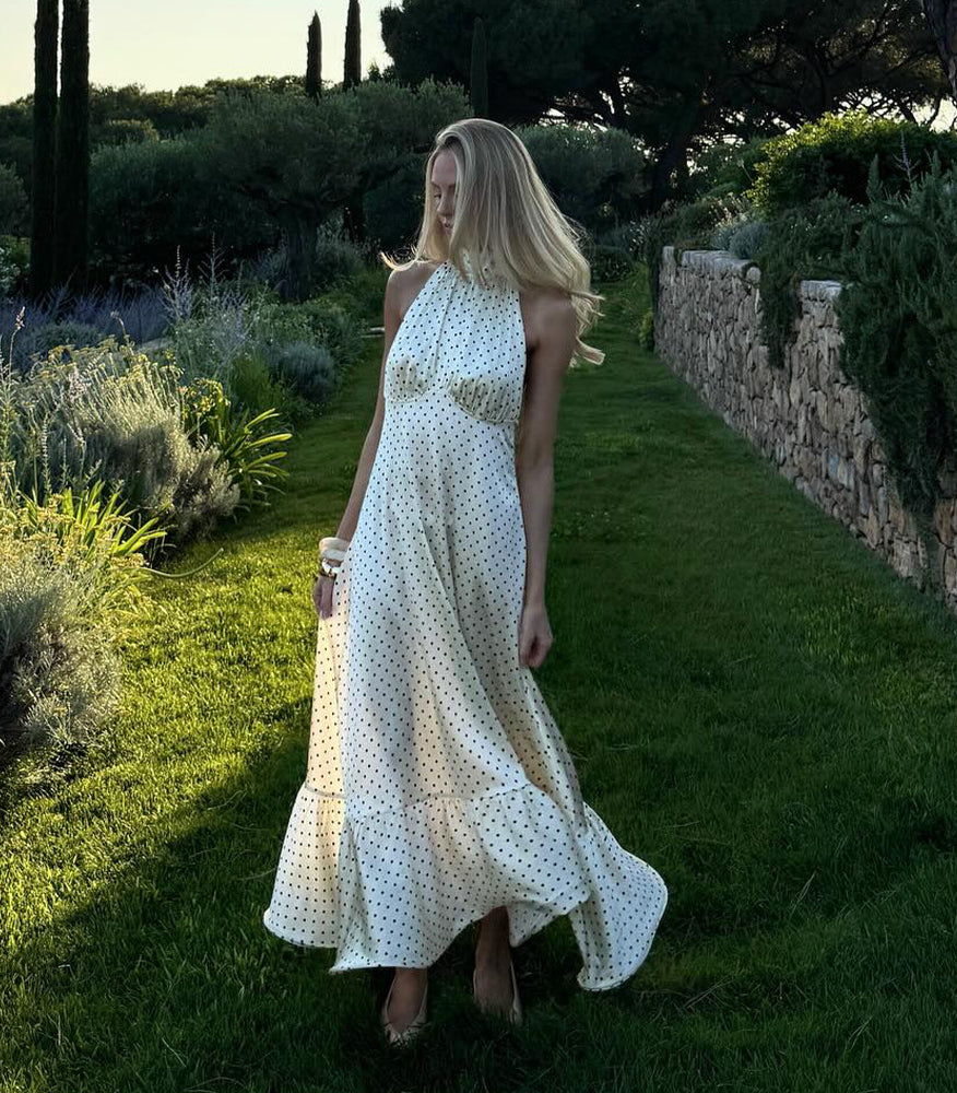 White polka dot halter neck satin maxi dress with floral lace hem