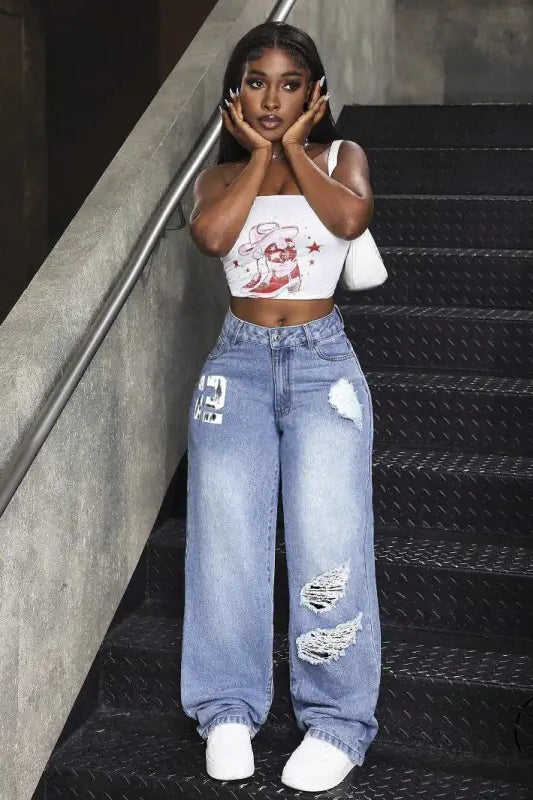 Woman in baggy match denim long jeans