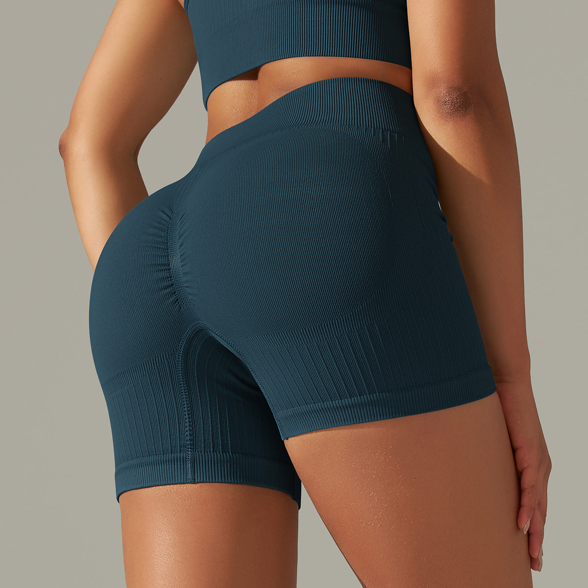 Teal ribbed workout shorts from Seamless Striped Peach Hip Raise collection for women