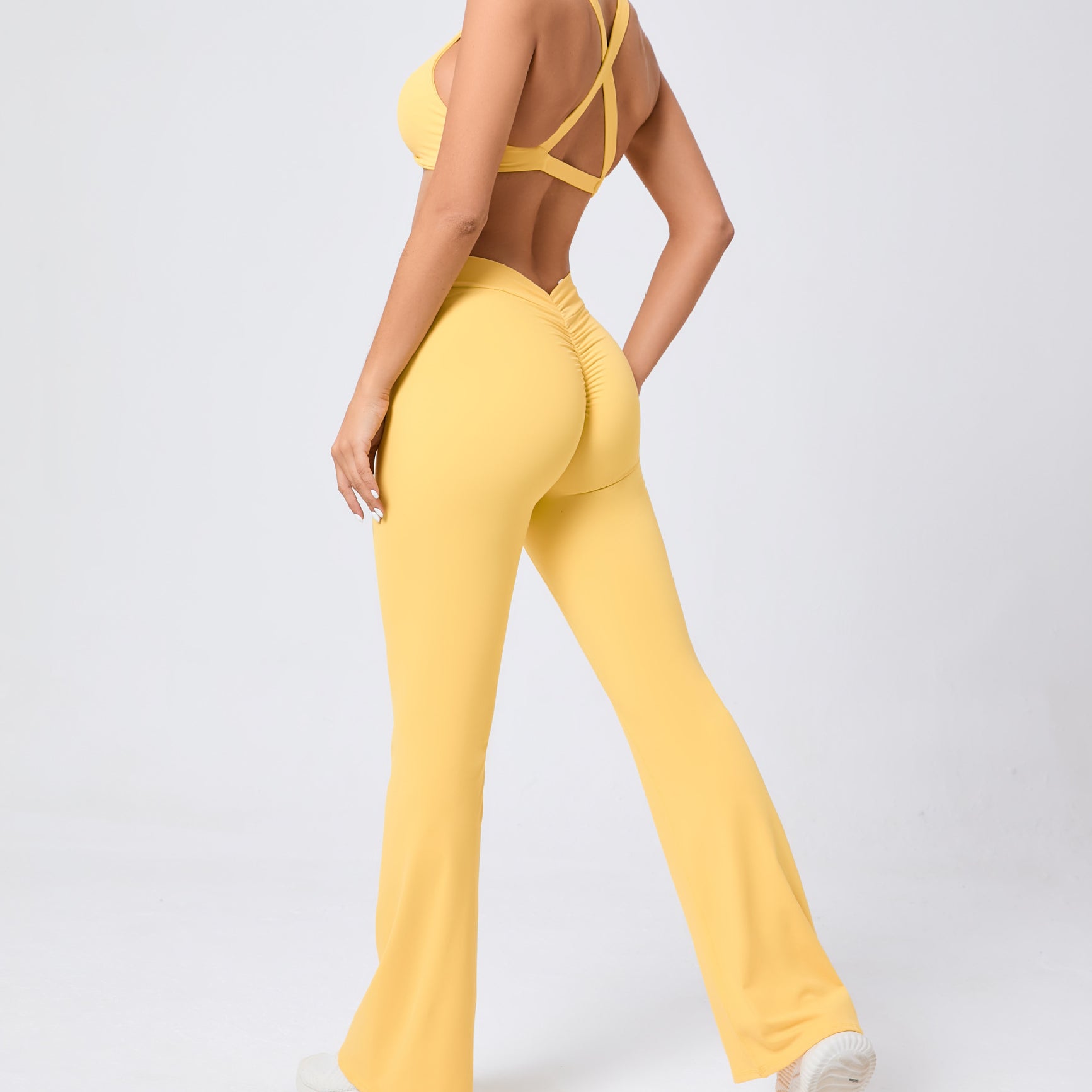 Peach hip raise tight brushed yoga backless jumpsuit with flared legs