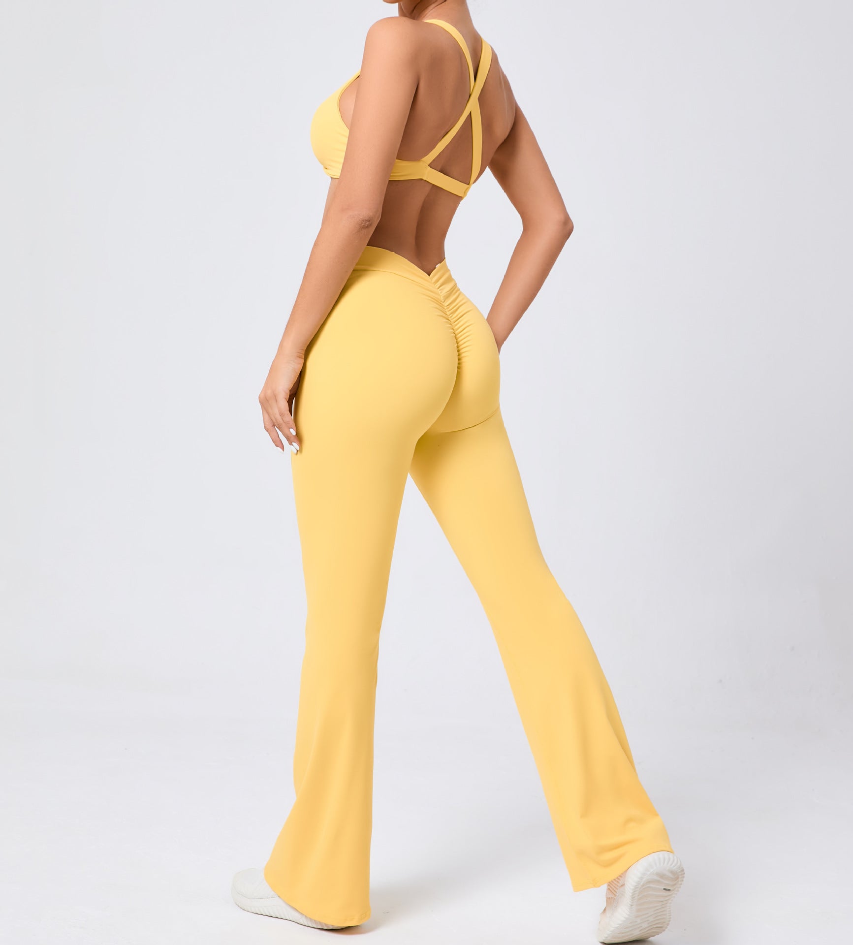Peach hip raise tight brushed yoga backless jumpsuit with flared legs