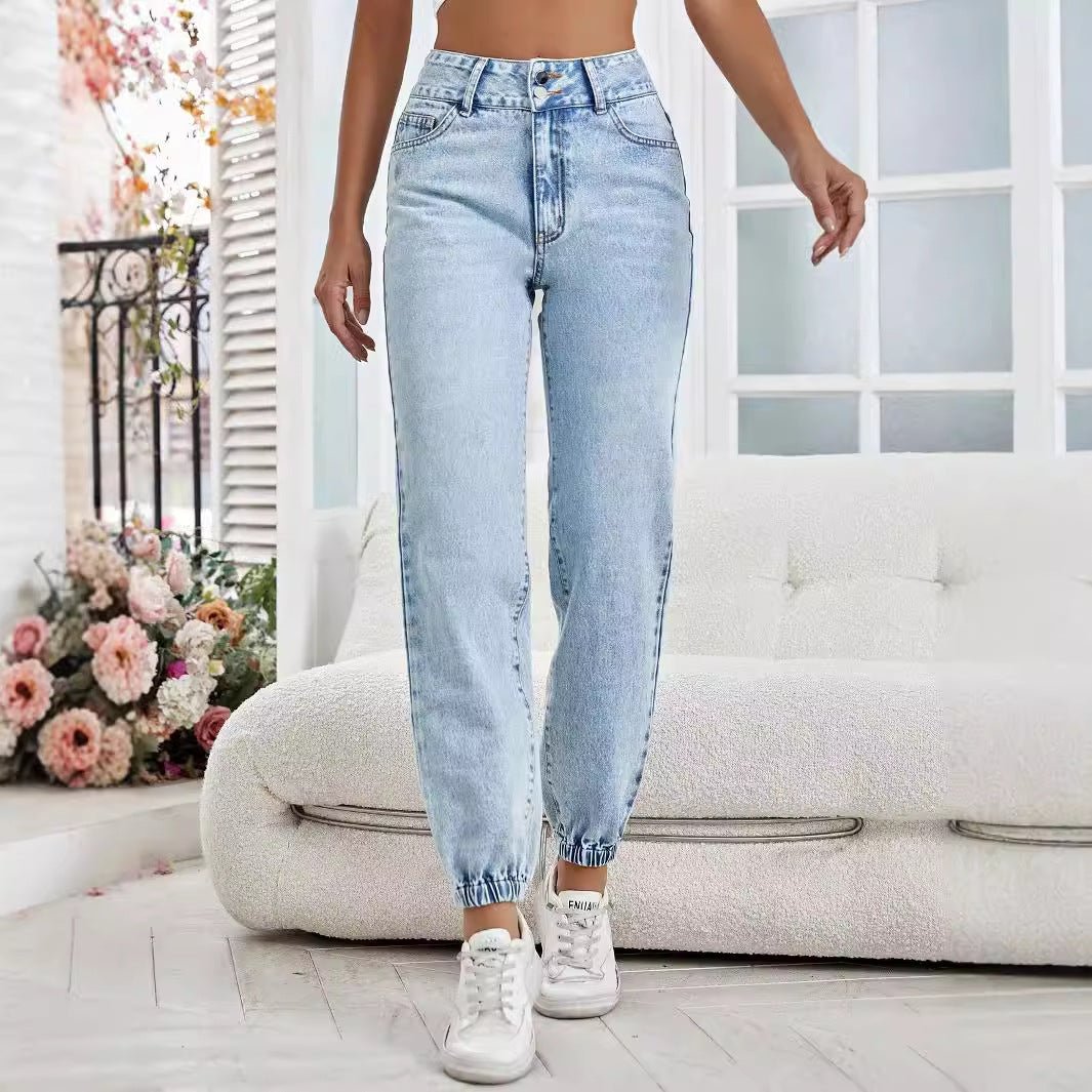 Light wash blue drooping loose denim pants with high waist and elastic cuffs