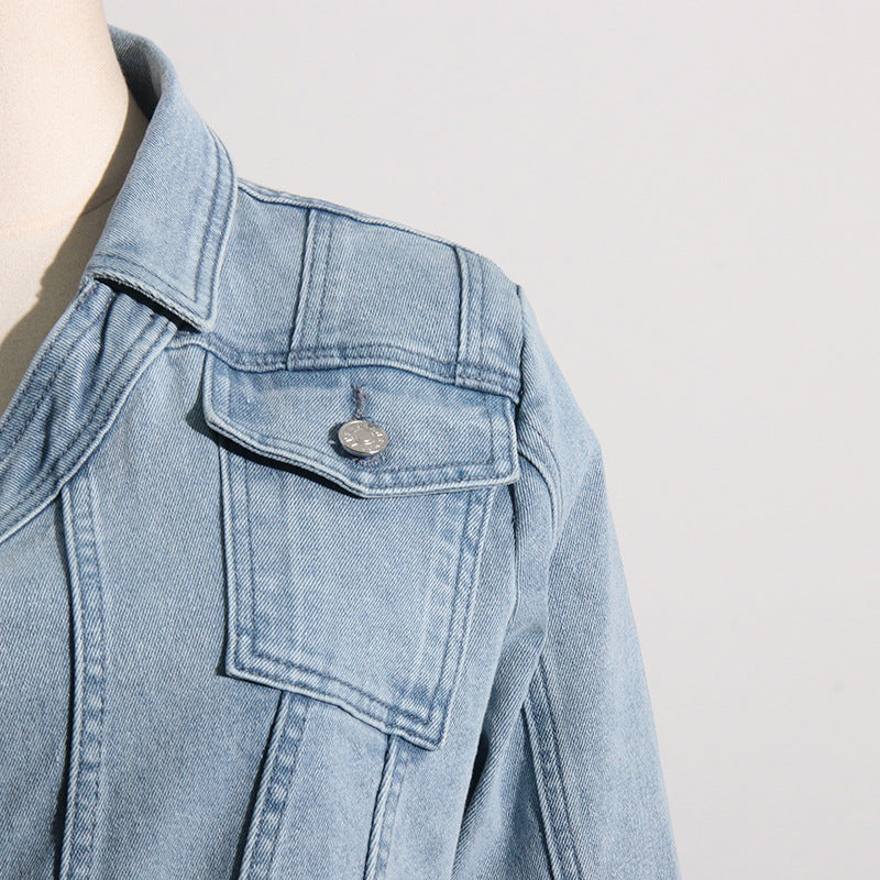 Light blue denim jacket showcasing off the shoulder design for stylish fashion