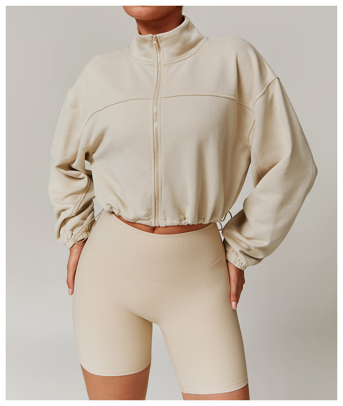 Cropped beige zip-up sweatshirt and matching biker shorts for Langry fashion ملابس