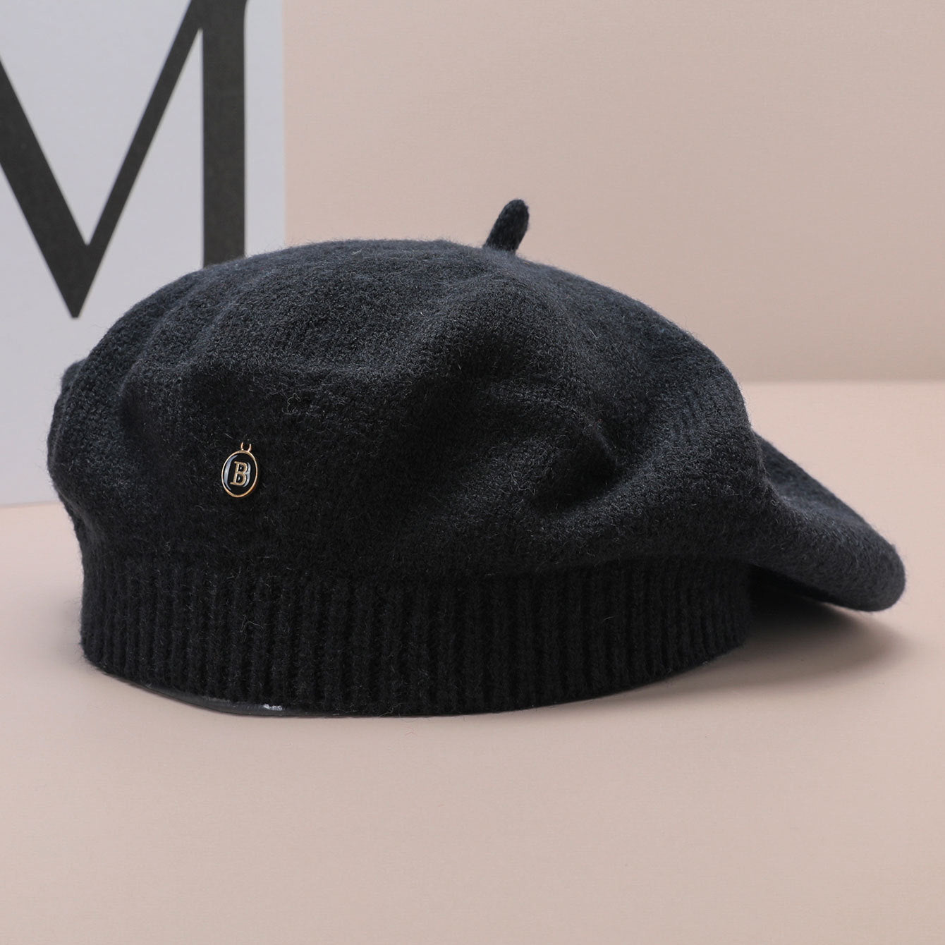Black knitted beret in Knitted Korean Small Painter Cloud Hat showcasing stylish fashion ملابس