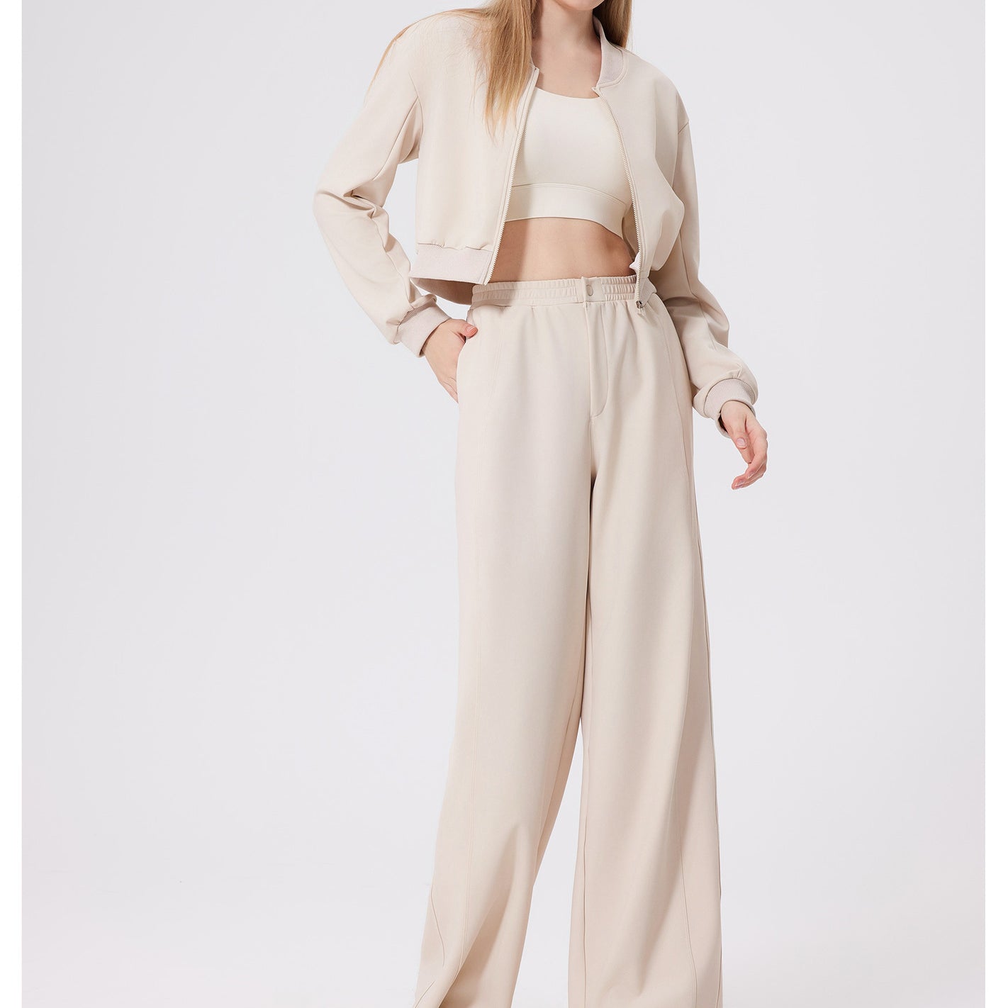 Beige minimalist cropped top, loose fitness warm pants, and matching jacket set