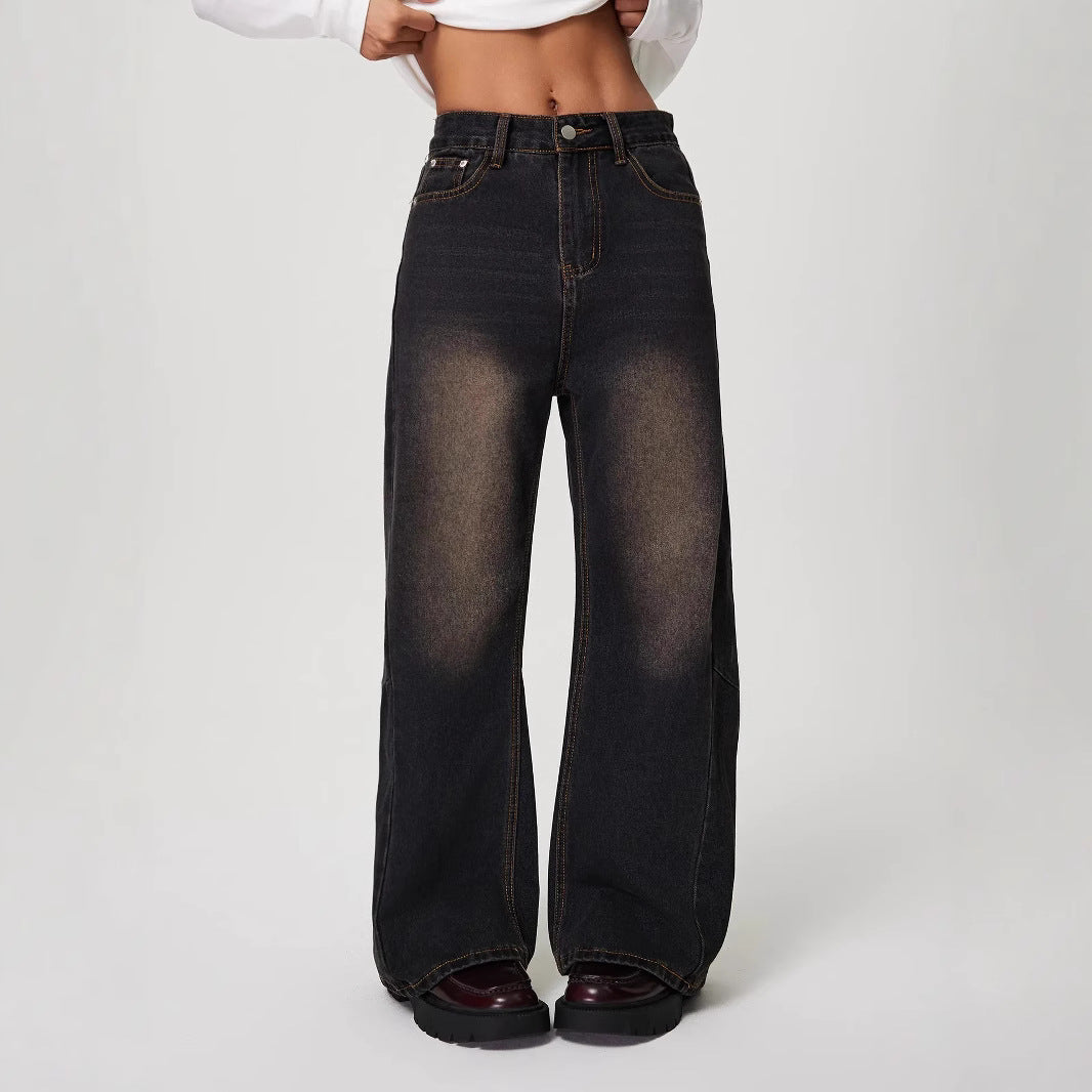 Wide-leg black denim jeans with faded knees, perfect for Langry fashion and ملابس styling