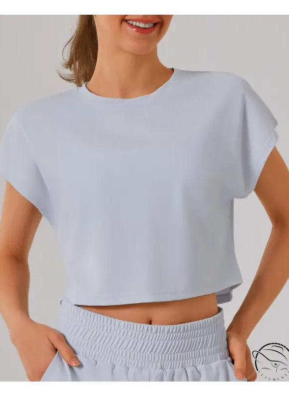 White loose cropped short-sleeve t-shirt from sports yoga fitness set