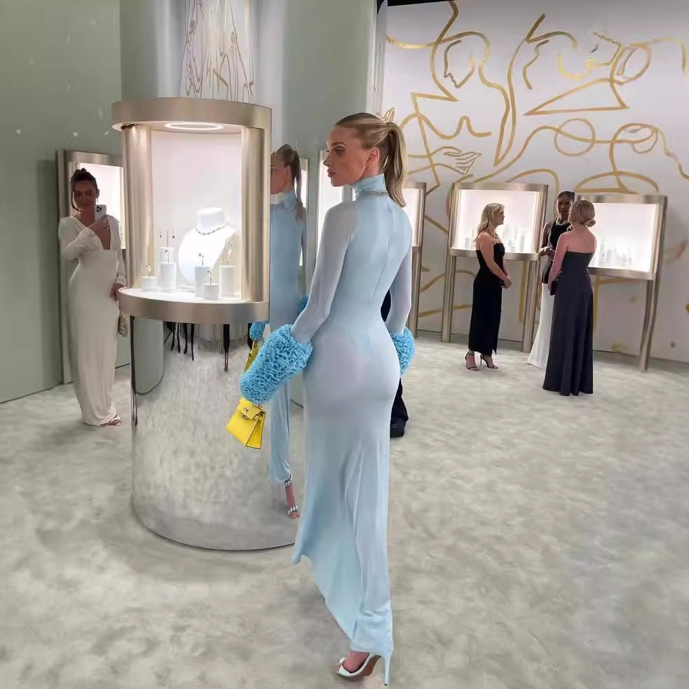Woman in a gorgeous light blue Slim Fit Dress with furry cuffs, stylish fashion ملابس