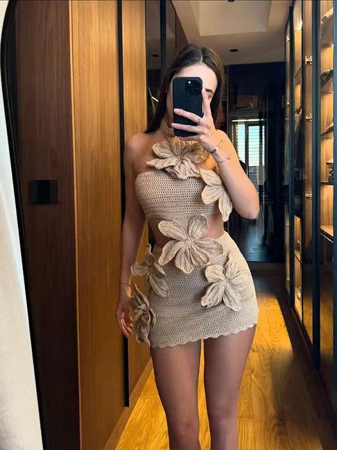 Beige knitted mini dress with floral appliqué, perfect for beach holiday fashion ملابس