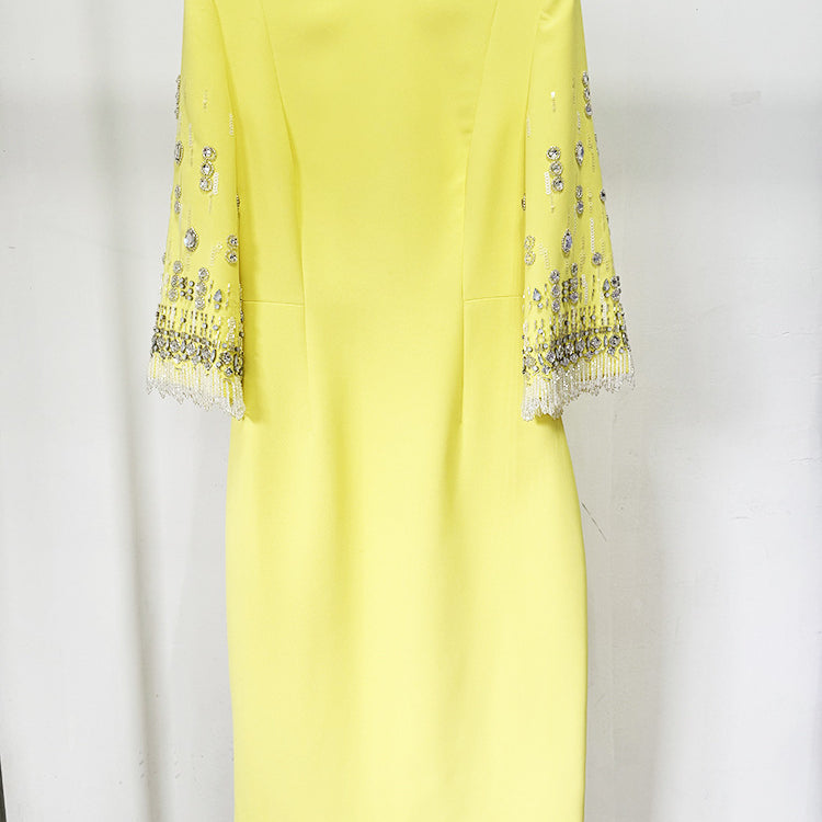 Elegant Yellow Diamond Embedded Mid Length Dress with embellished sleeves, a fashionable choice