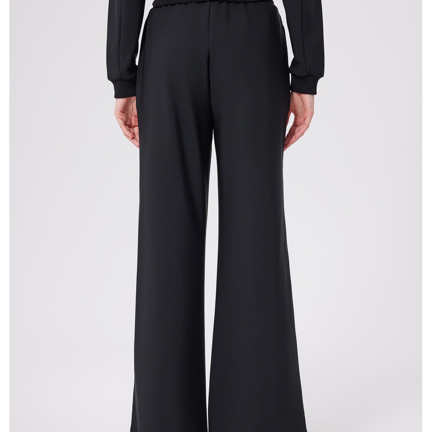 Black loose fitness warm pants with high-waist button closure