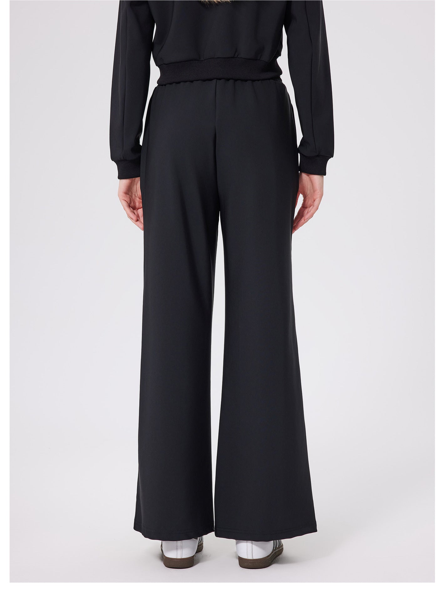 Black loose fitness warm pants with high-waist button closure