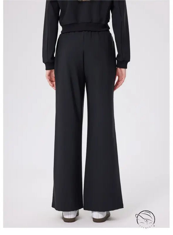 Black loose fitness warm pants with high waist and button closure