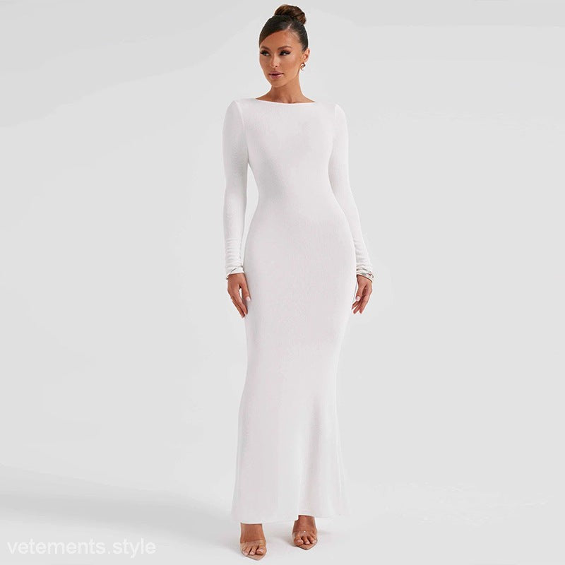 Elegant white long-sleeved backless dress, perfect for formal occasions and stylish events