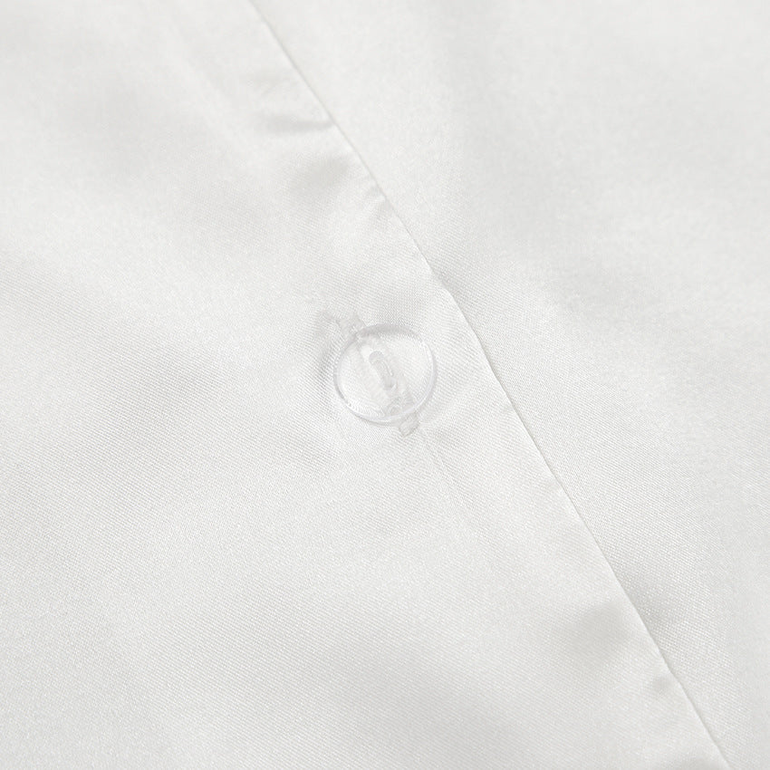 White satin fabric with a clear button, perfect for luxury home wear and fashion
