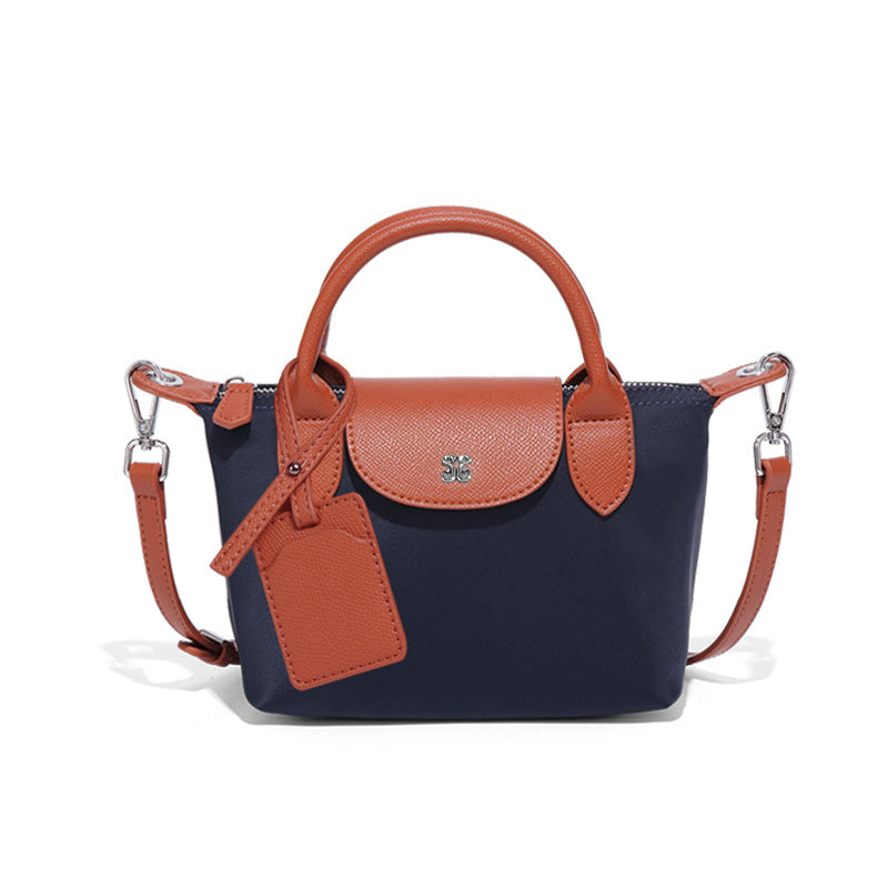 Navy and brown leather handbag from Mini All Match Shoulder Bag for stylish fashion choices