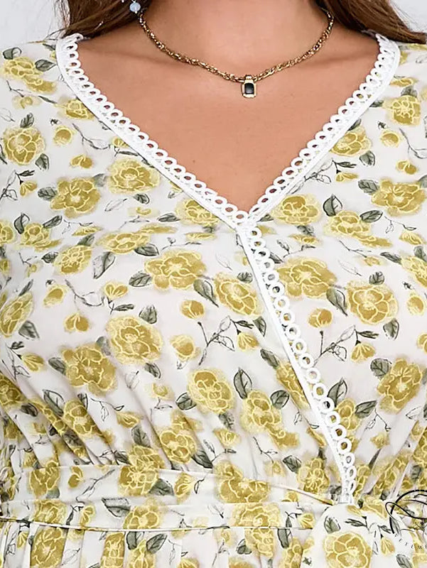 Boho lace floral dress in white with yellow pattern and lace trim