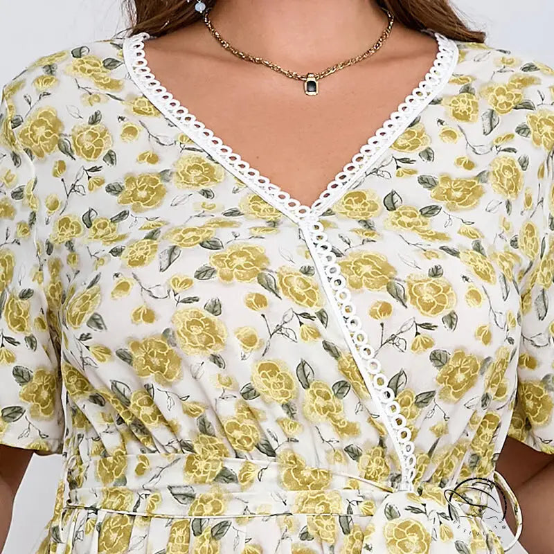 Boho lace floral dress in white with yellow pattern and lace trim