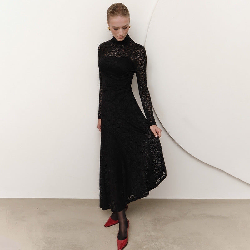 Elegant woman wearing black lace long-sleeved midi dress with red heels, perfect for fashion and ملابس