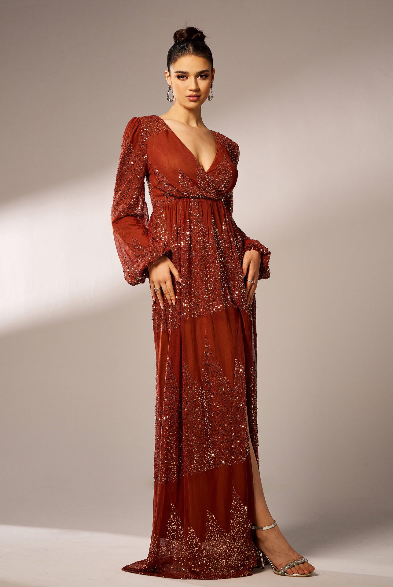 Elegant beaded gown showcasing high-end fashion in ملابس for evening events